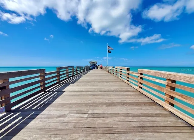 a view of lake with sunset