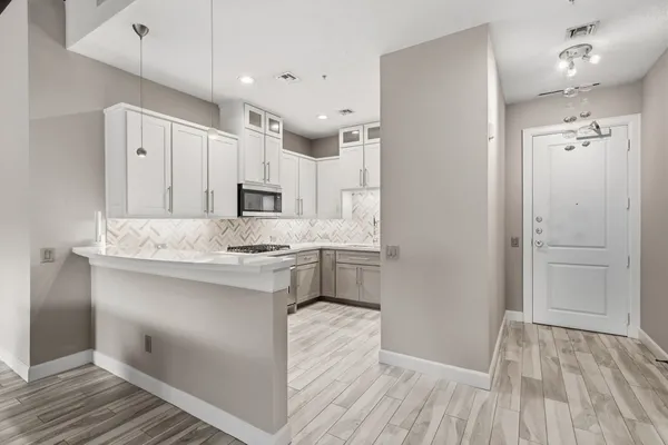 $1,150,000 | 3 Waterway Court, Unit 1B, The Woodlands, TX 77380