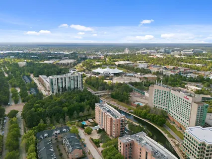 a view of city with tall buildings