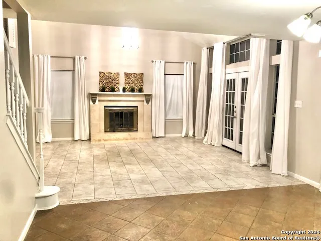 a view of a kitchen with an empty room