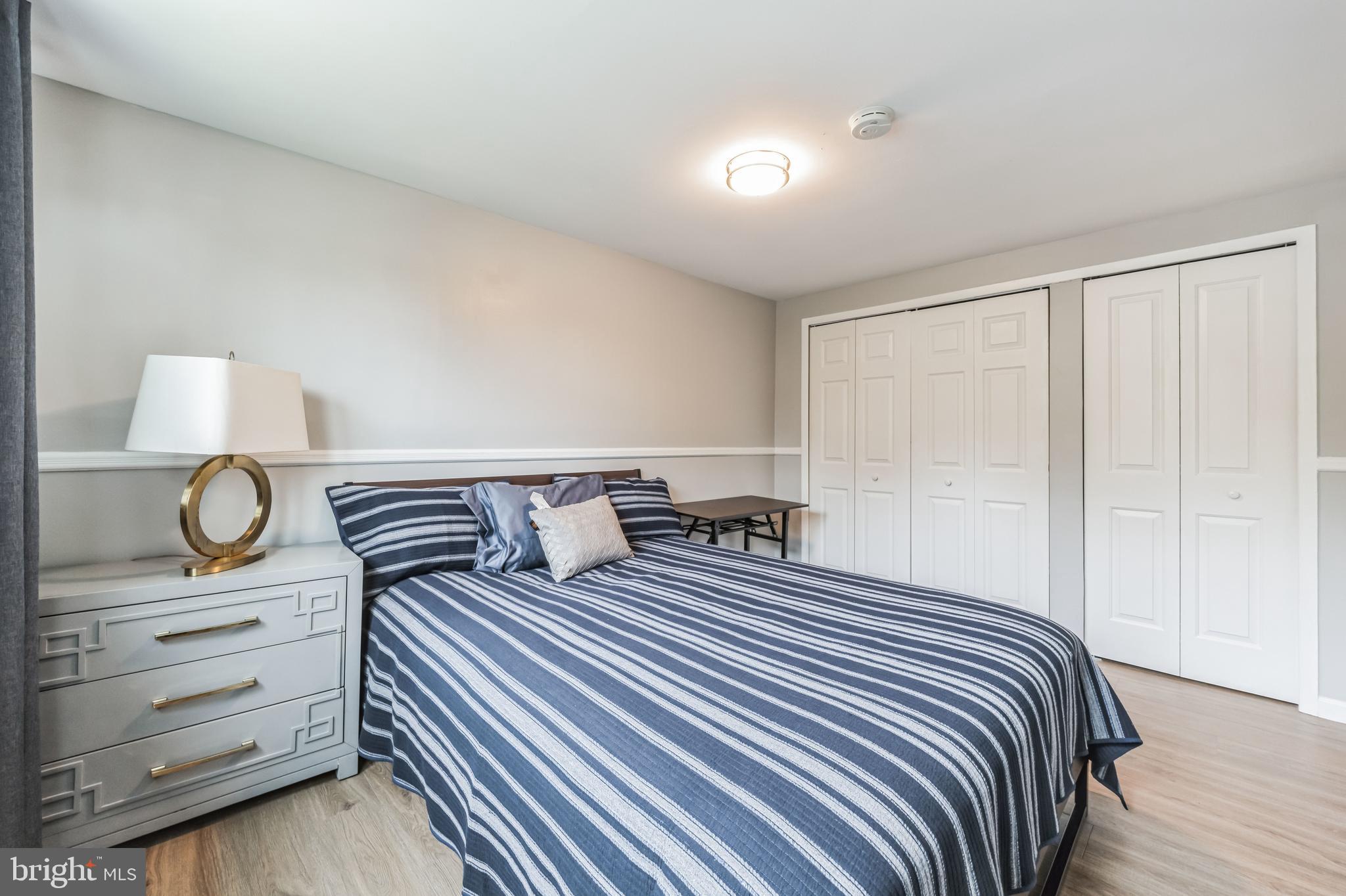 23 Raleigh Place Willingboro, NJ 08046 - Photo 19 of 27 a bedroom with a bed and cabinet