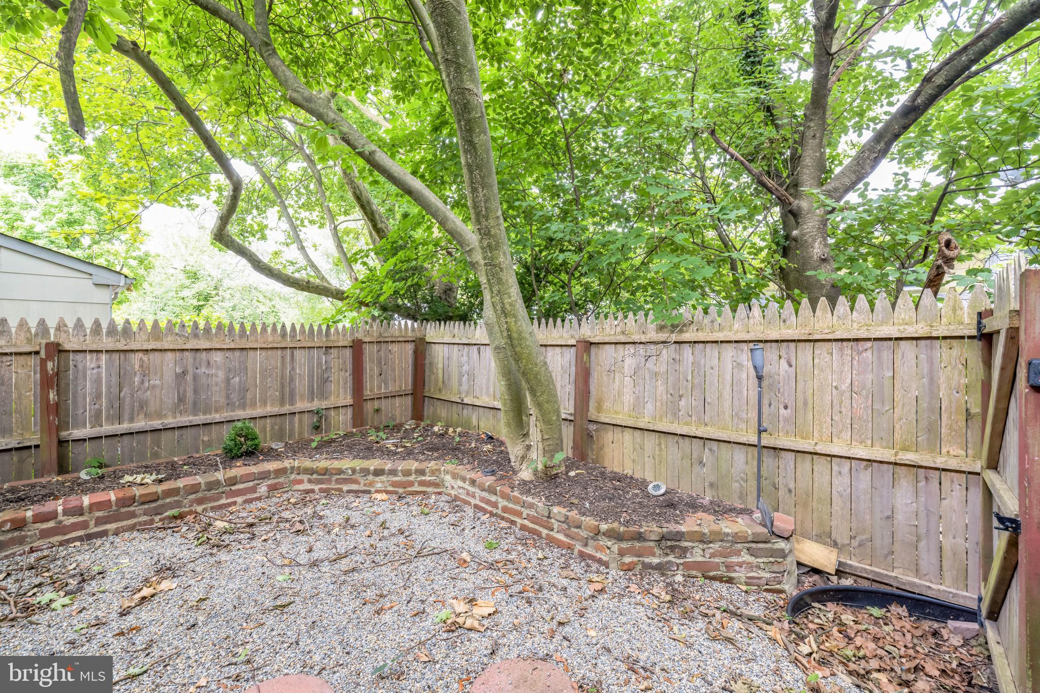 23 Raleigh Place Willingboro, NJ 08046 - Photo 27 of 27 a backyard of a house with green landscape