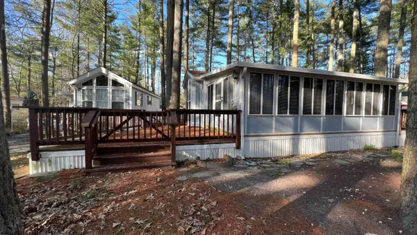 a view of a porch with a yard
