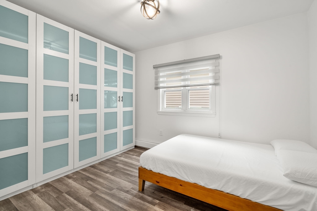 20 Pleasant View Avenue Everett, MA 02149 - Photo 15 of 22 a bedroom with a bed and a window