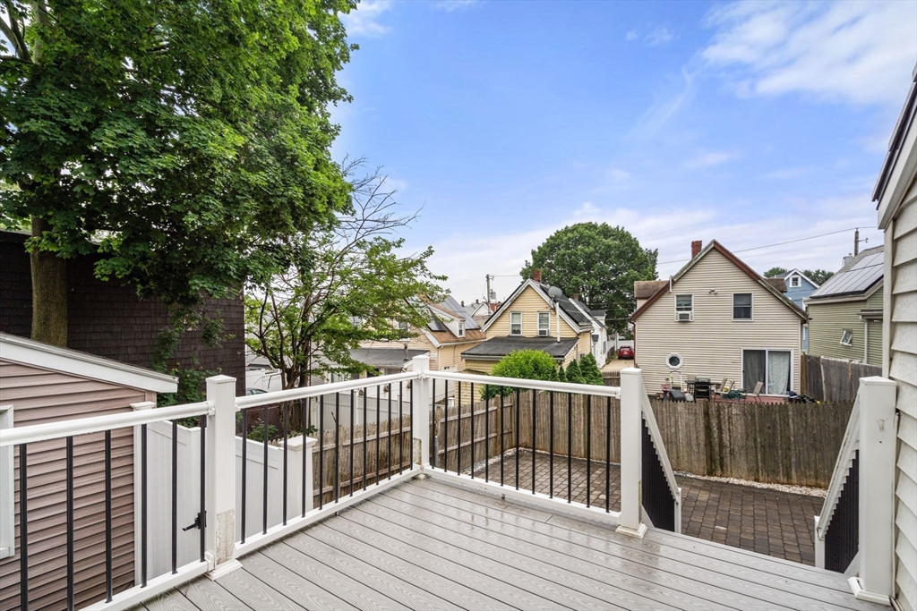20 Pleasant View Avenue Everett, MA 02149 - Photo 9 of 22 a view of a house with a deck