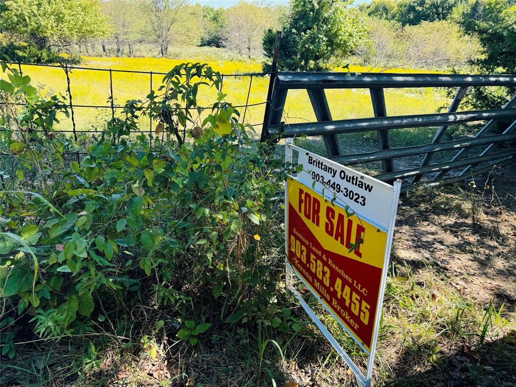 Tbd County Road 3045 Bonham, TX 75438 - Photo 12 of 14 a sign that is on a brick wall
