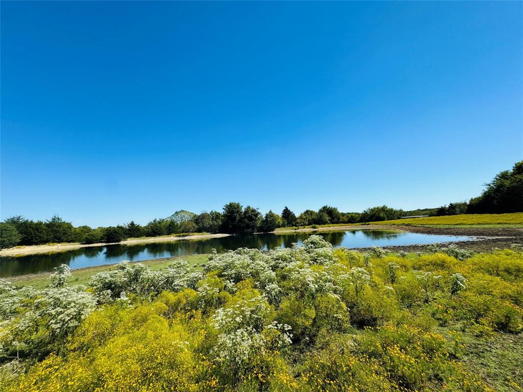 Tbd County Road 3045 Bonham, TX 75438 - Photo 3 of 14 a view of lake and houses with outdoor space
