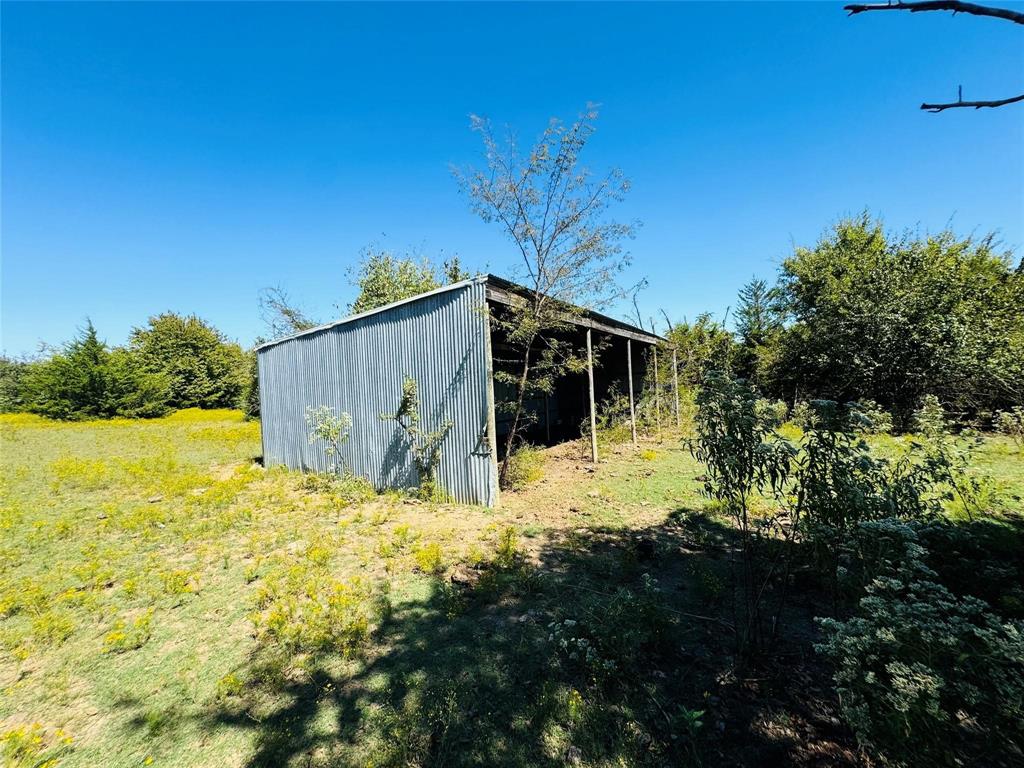 Tbd County Road 3045 Bonham, TX 75438 - Photo 10 of 14 a view of a house with a yard