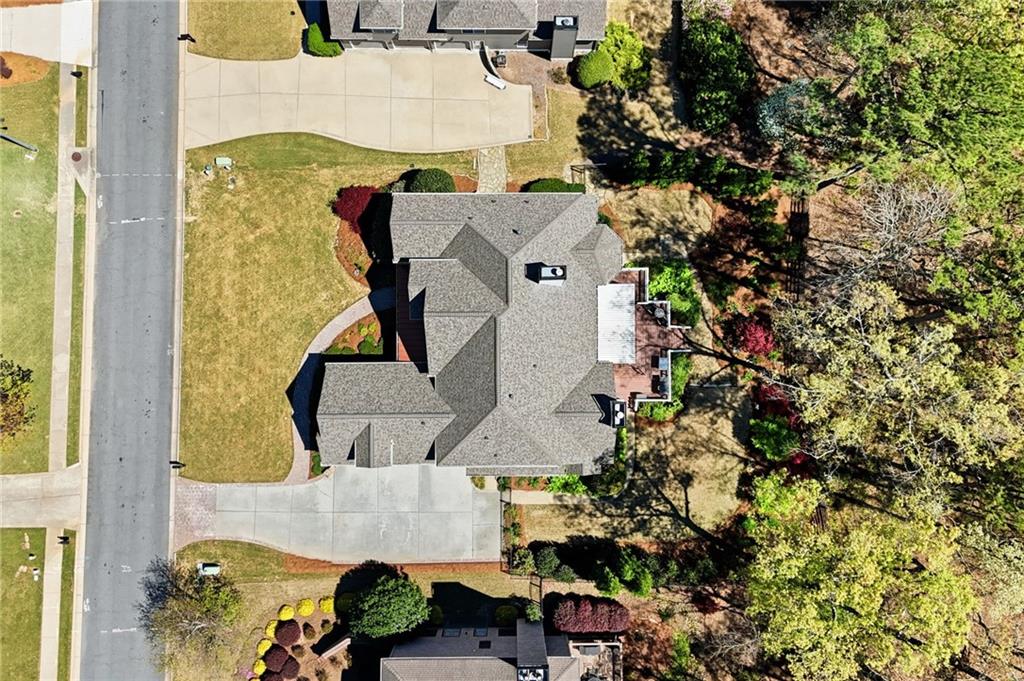 4147 Gold Mill Ridge Canton, GA 30114 - Photo 69 of 93 an aerial view of residential houses with outdoor space