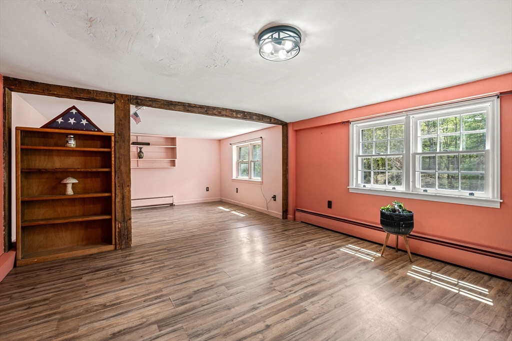 600 Main Street Ashby, MA 01431 - Photo 19 of 40 a view of an empty room with a window