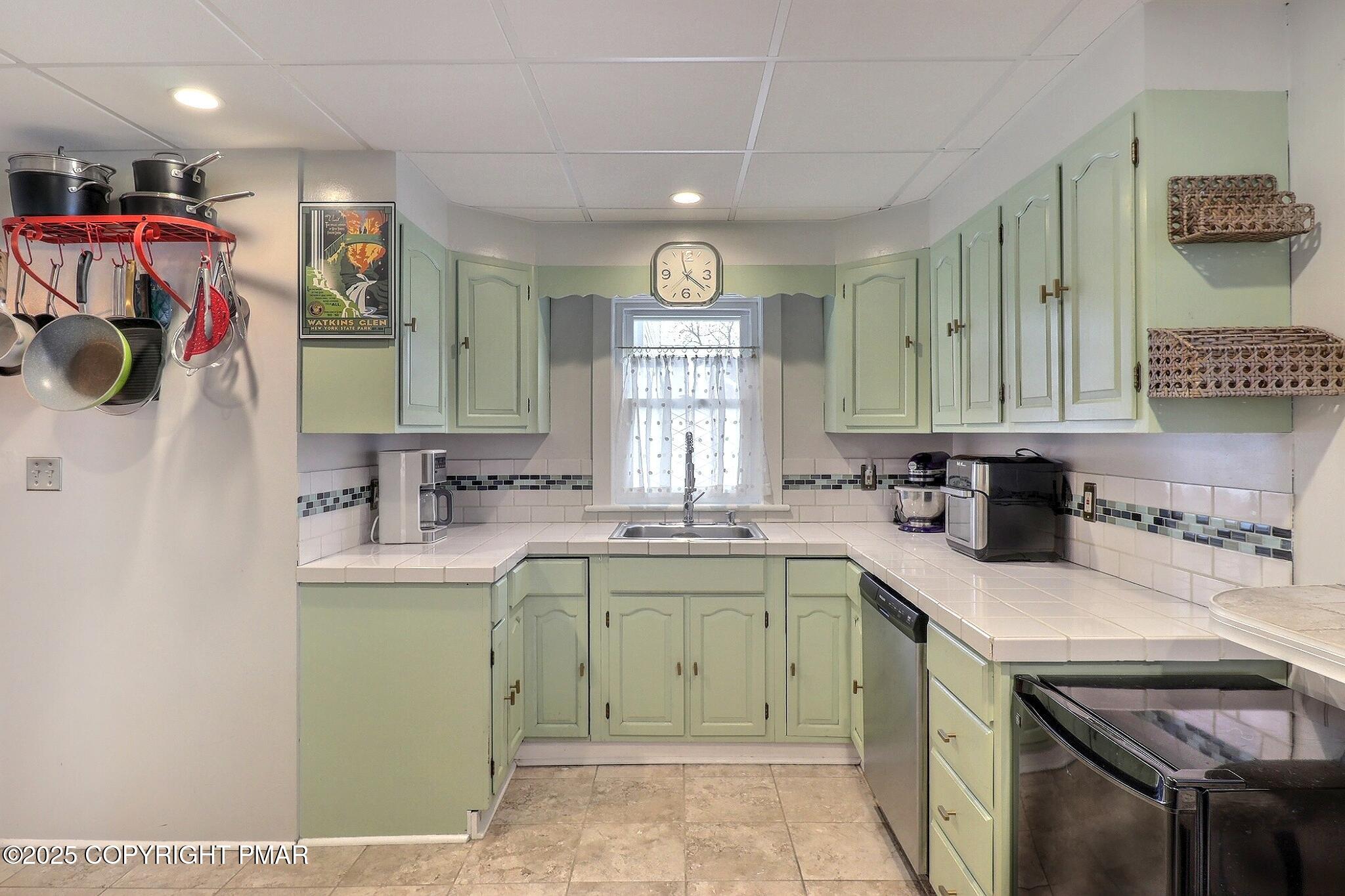 541 Barry Street Stroudsburg, PA 18360 - Photo 12 of 49 a view of a kitchen with a sink and cabinets