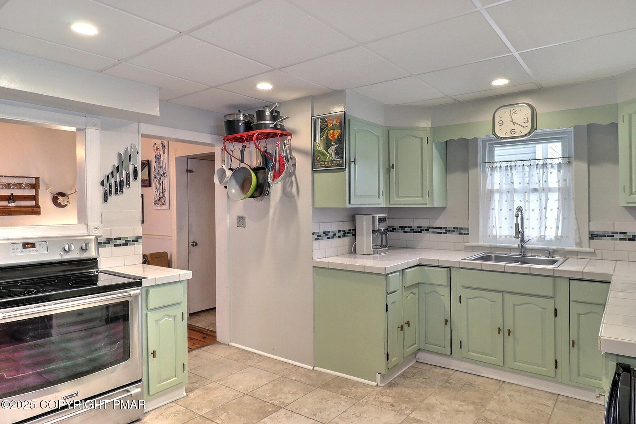 541 Barry Street Stroudsburg, PA 18360 - Photo 14 of 49 a kitchen with a sink stove and refrigerator