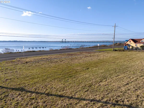 a view of a water with a nearby beach