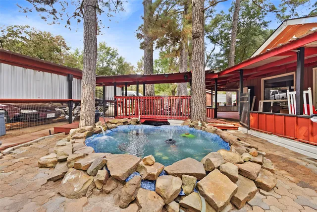 a view of a backyard with a patio