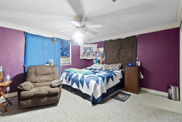 a spacious bathroom with a granite countertop sink and a mirror