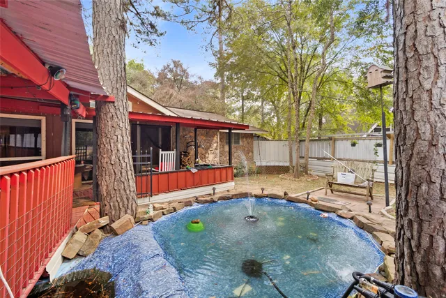 a view of a patio with chairs and wooden floor