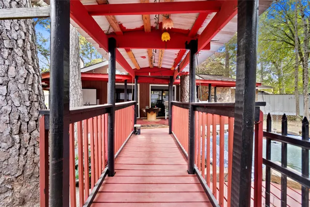 a view of a swimming pool with a table and chairs