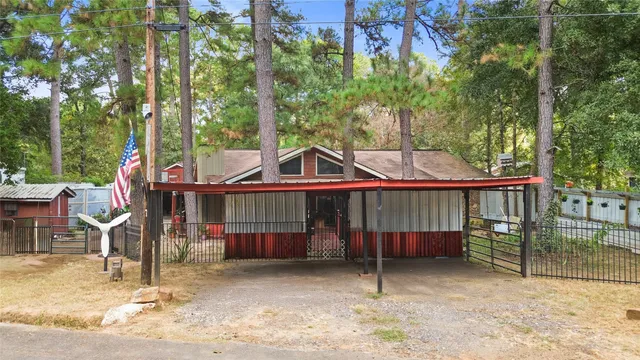 a front view of a house with fountain