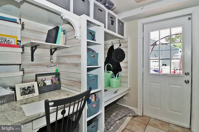 a view of a house with white door