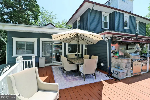 a view of a two chairs in a garden