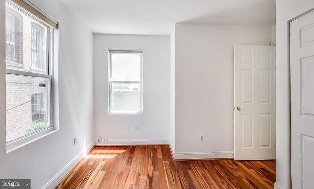 729 10th Street Northeast Washington, DC 20002 - Photo 11 of 15 a view of a room with wooden floor and window