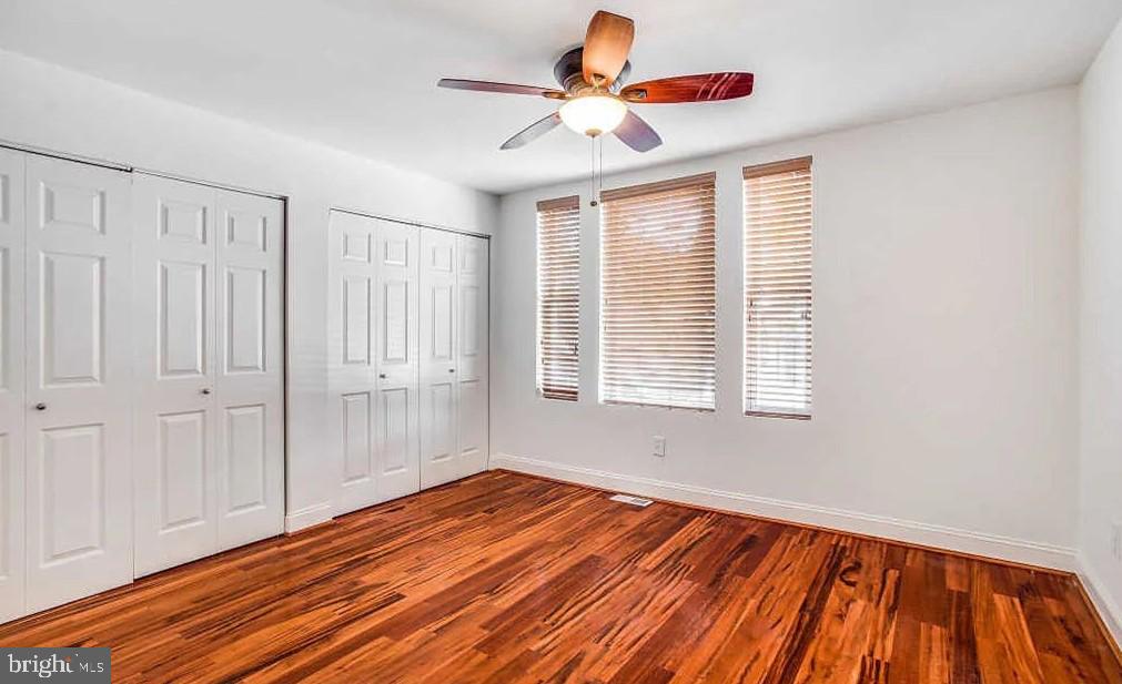 729 10th Street Northeast Washington, DC 20002 - Photo 10 of 15 a view of an empty room with wooden floor and a window