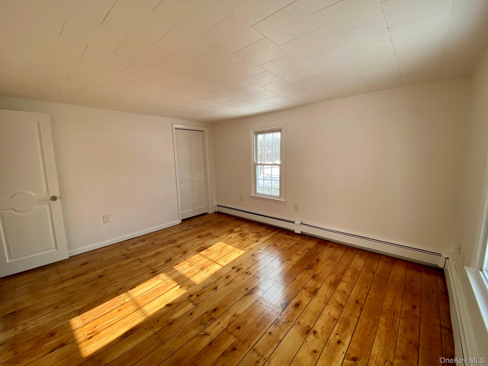 42 Amity Road Warwick, NY 10990 - Photo 21 of 33 The first of three bedrooms with ornate hardwood floors.