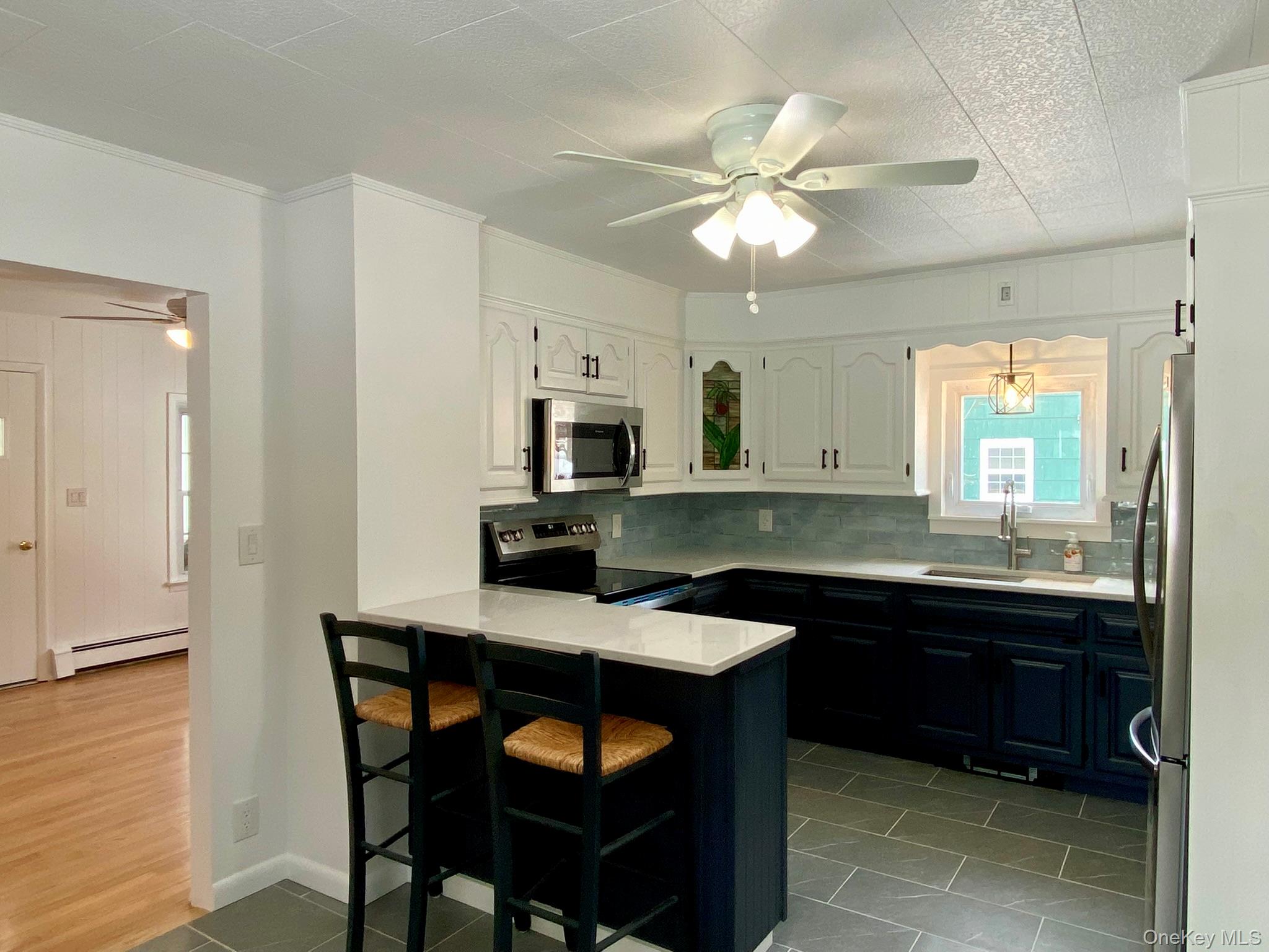 42 Amity Road Warwick, NY 10990 - Photo 6 of 33 Well appointed kitchen with stainless appliances, ample storage space and breakfast bar.