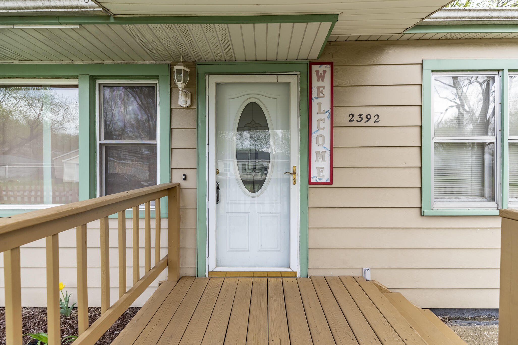 a view of a wooden door of a house