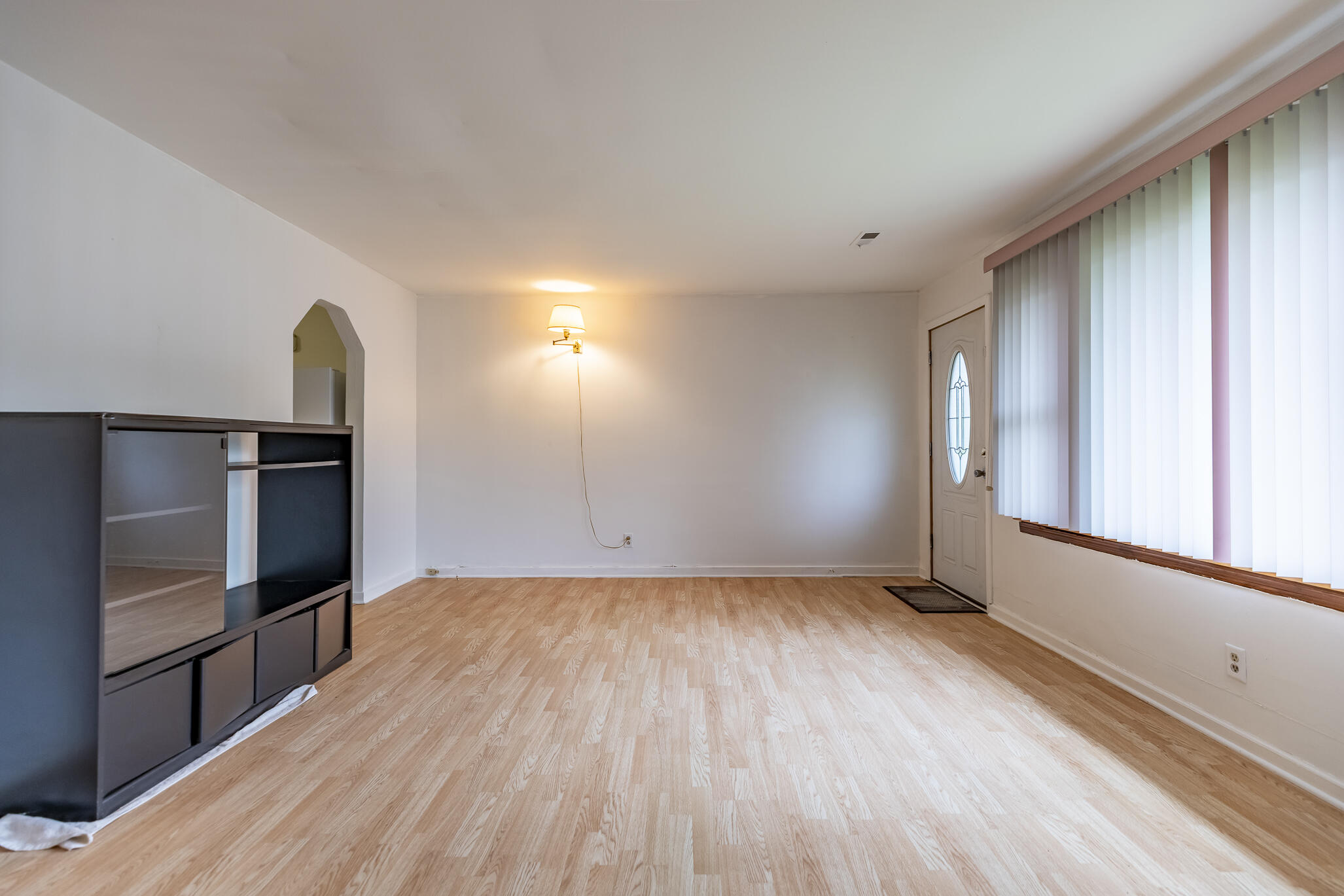 2392 Wheeler Street Gary, IN 46406 - Photo 3 of 17 a view of a livingroom with wooden floor