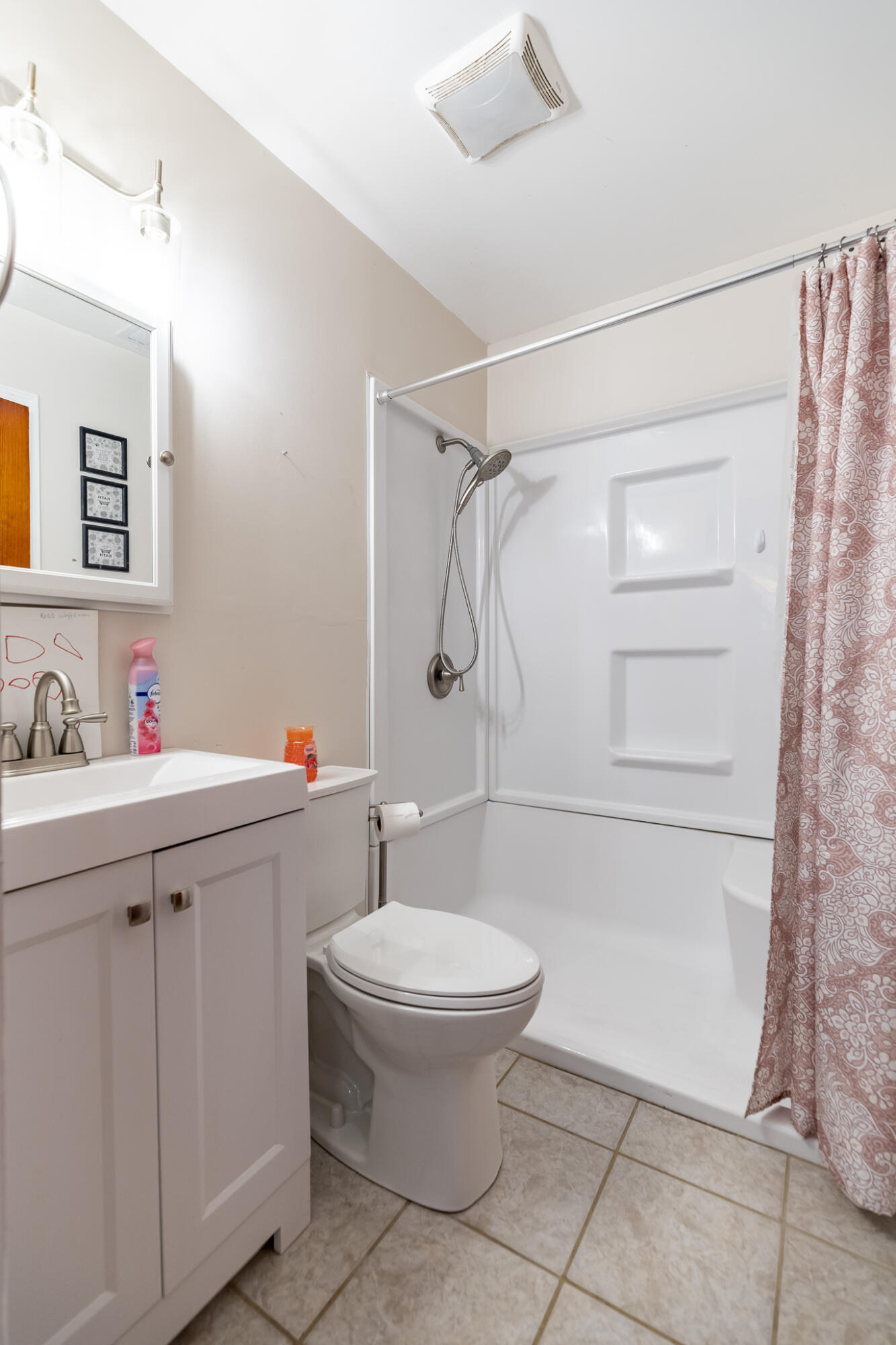 2392 Wheeler Street Gary, IN 46406 - Photo 10 of 17 a bathroom with a sink toilet and shower