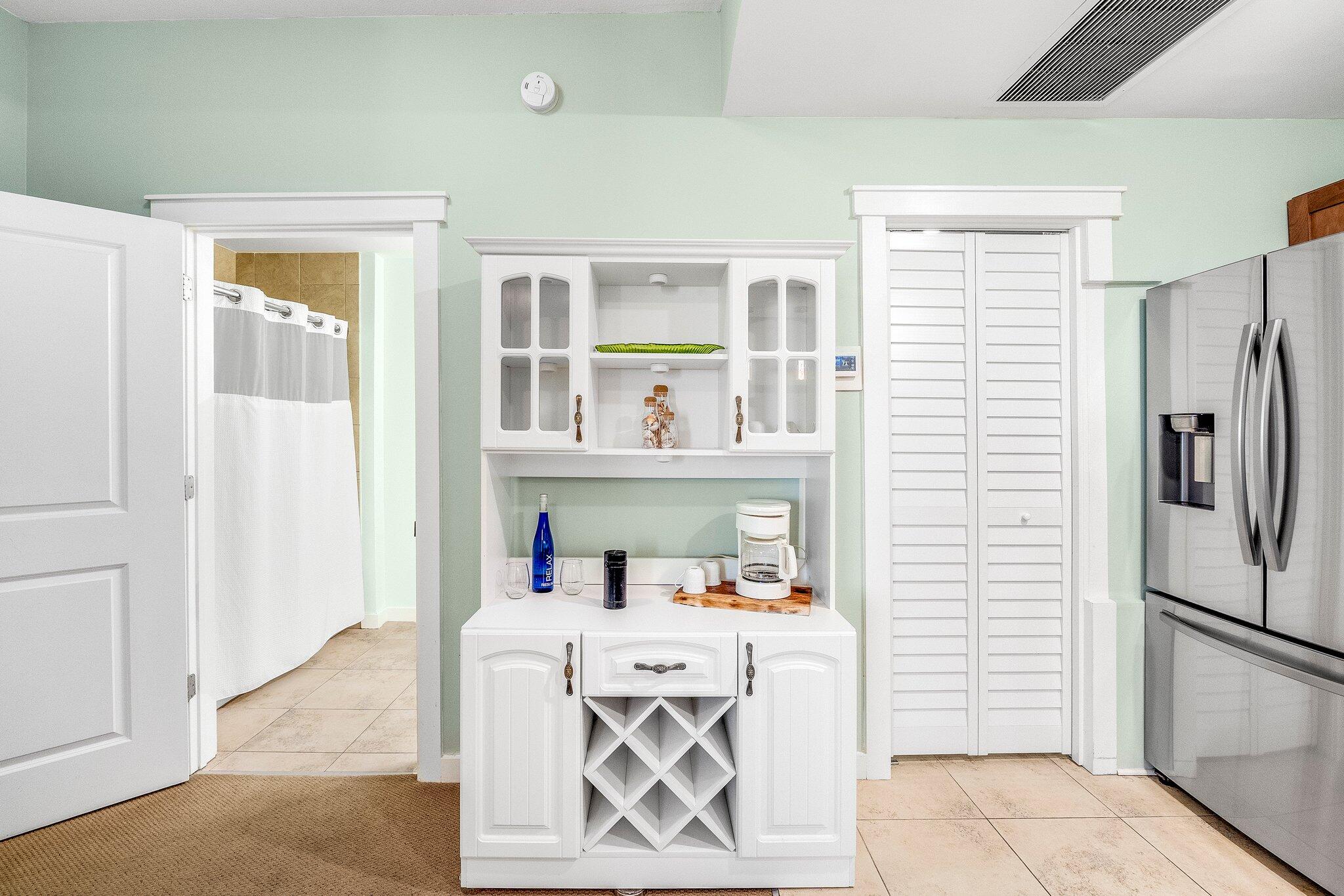 15100 Front Beach Road, Unit 517 Panama City Beach, FL 32413 - Photo 14 of 21 a view of kitchen with furniture and refrigerator