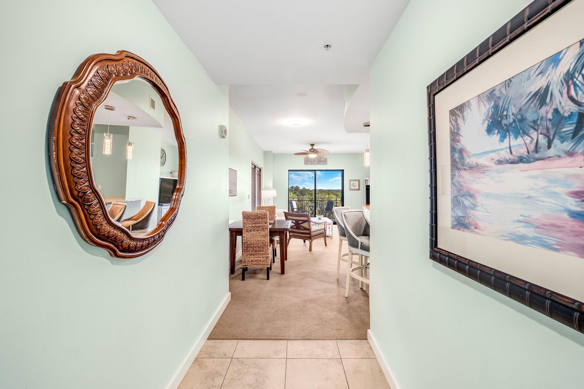 15100 Front Beach Road, Unit 517 Panama City Beach, FL 32413 - Photo 2 of 21 a view of a livingroom with furniture and a window