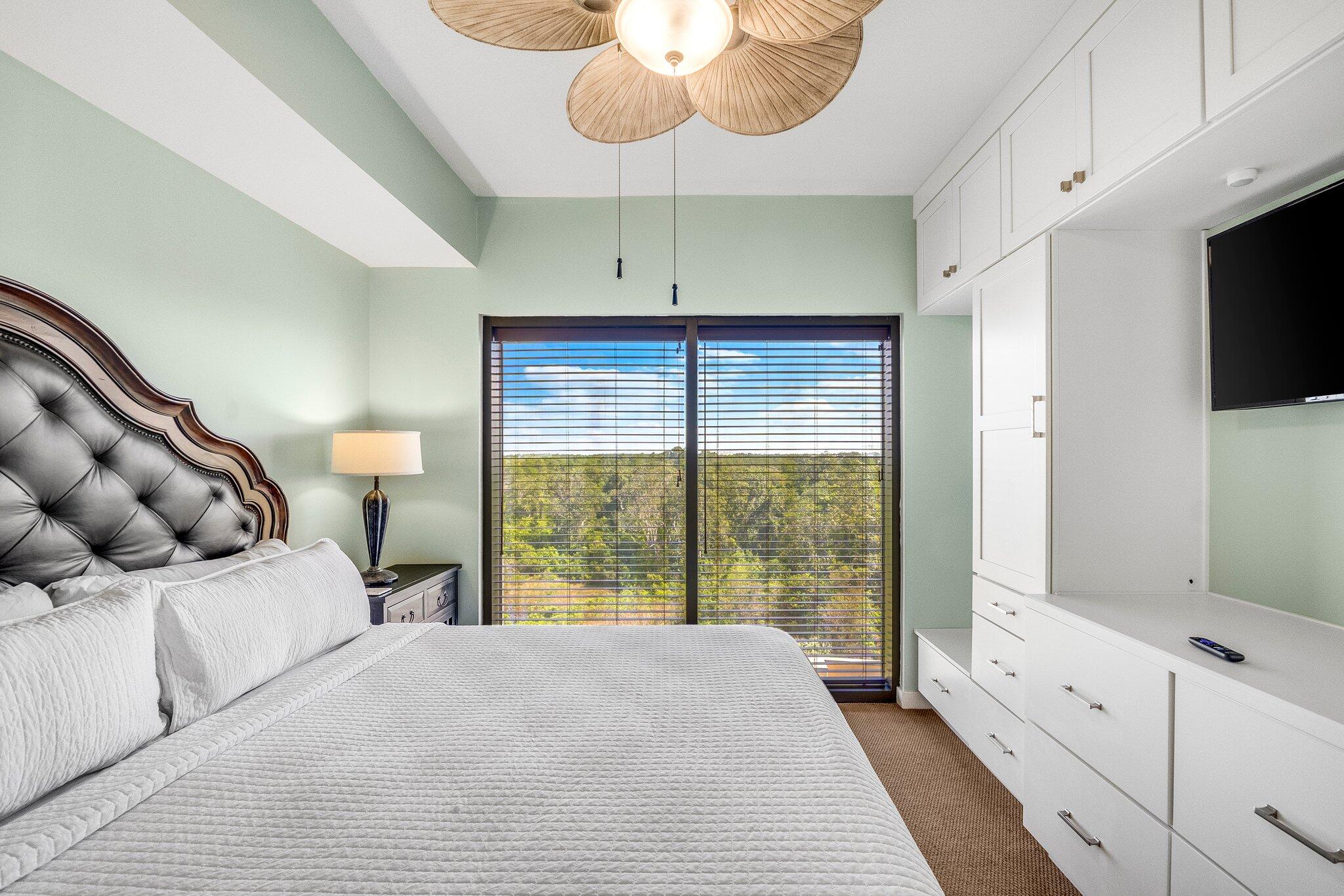 15100 Front Beach Road, Unit 517 Panama City Beach, FL 32413 - Photo 5 of 21 a bedroom with a bed and a large window