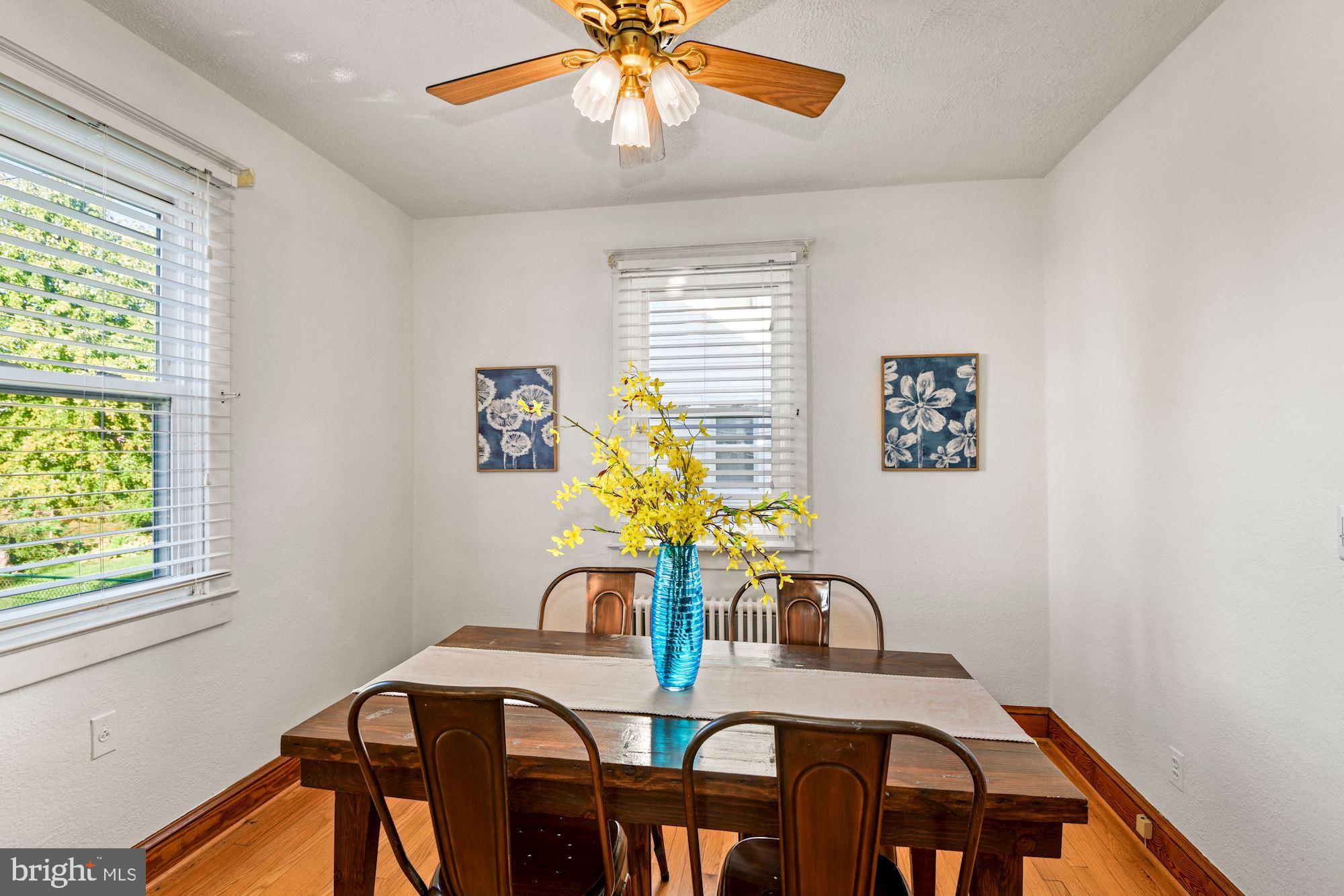 5524 Ashbourne Road Baltimore, MD 21227 - Photo 9 of 23 a dining room with furniture and window