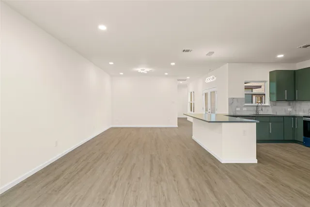 a view of a backyard with a garden