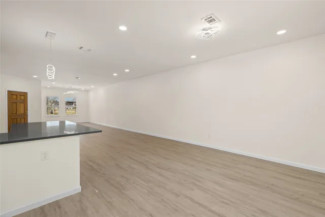 a bathroom with a sink a mirror and a vanity