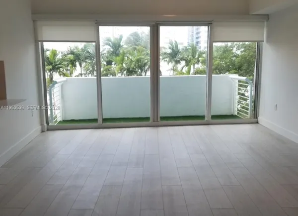 an empty room with windows