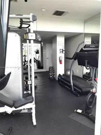 a view of multiple houses with a yard