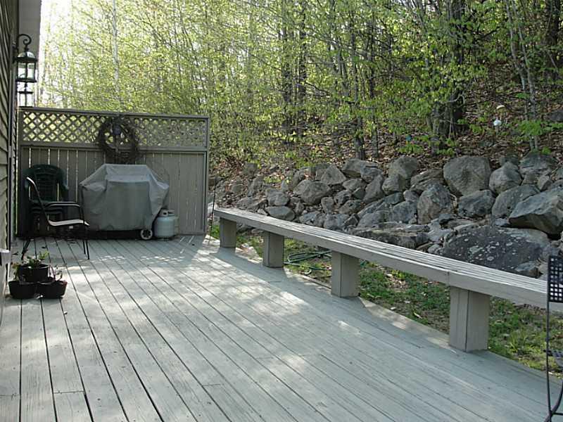 95 Harrison Heights Road Harrison, ME 04040 - Photo 22 of 33 Patio/Deck. Rock gardens to the right.