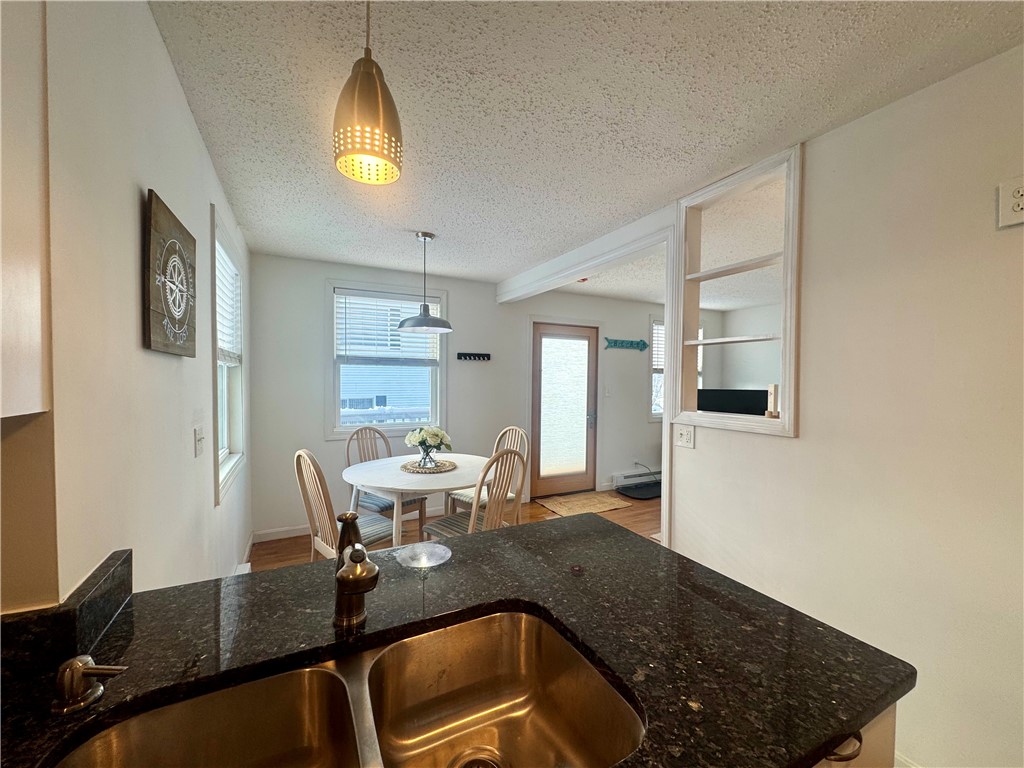 7 White Cap Road Narragansett, RI 02882 - Photo 9 of 33 Looking from the kitchen counter to the dining area