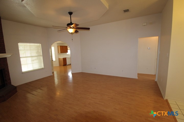5211 James Loop Killeen, TX 76542 - Photo 14 of 18 an empty room with windows and fan