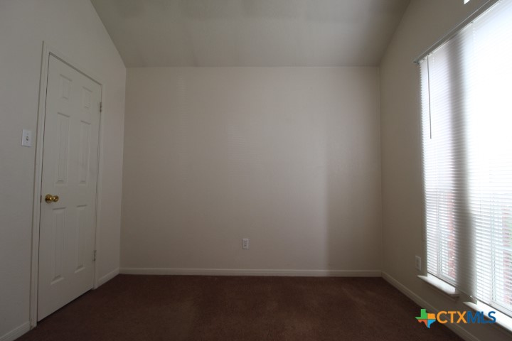 5211 James Loop Killeen, TX 76542 - Photo 9 of 18 an empty room with a window