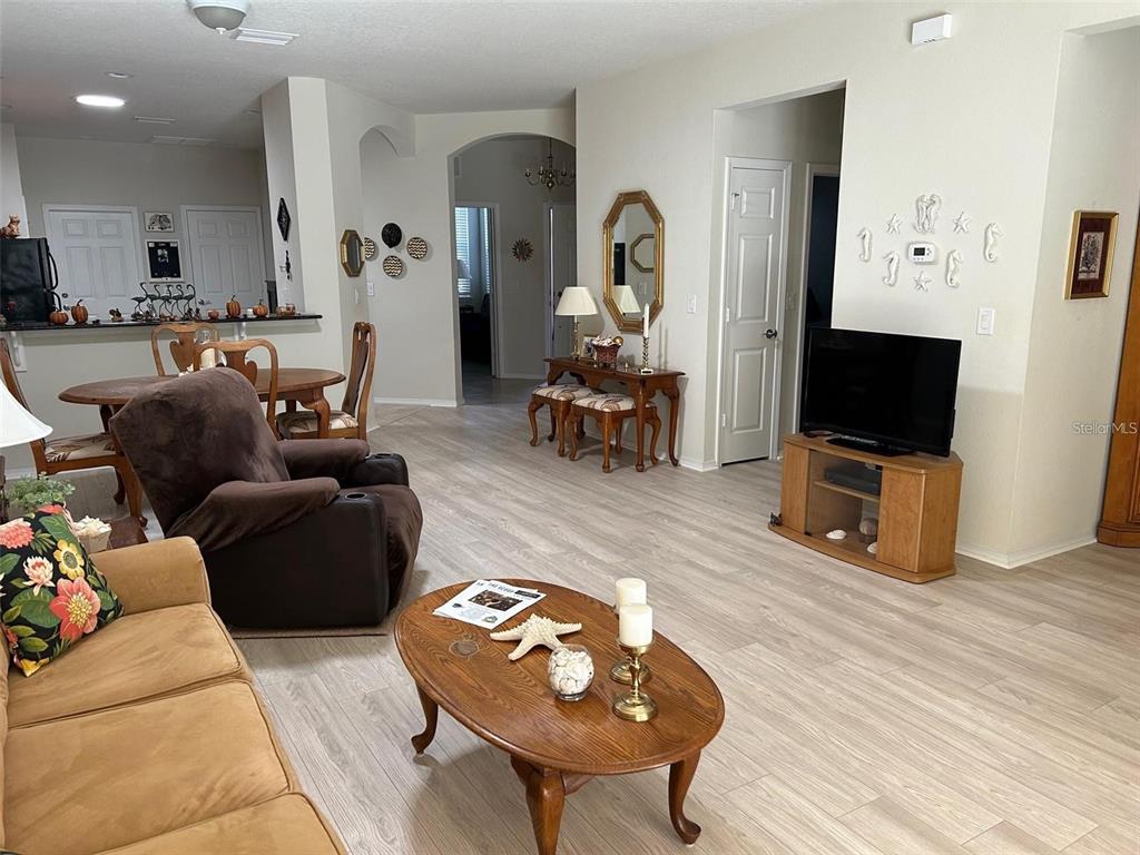 428 Seneca Falls Drive Apollo Beach, FL 33572 - Photo 7 of 31 a living room with furniture and a flat screen tv