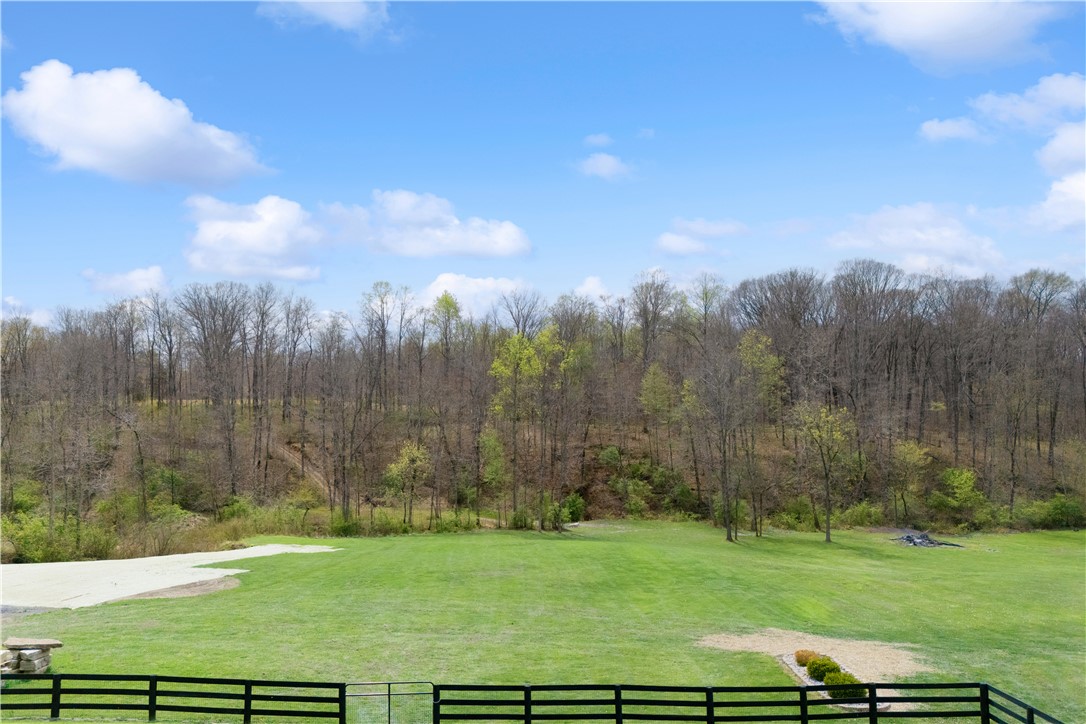 1158 Pyle Road Clarksville, OH 45113 - Photo 58 of 76 Expansive green yard with tree-lined hills offers serene, open views.