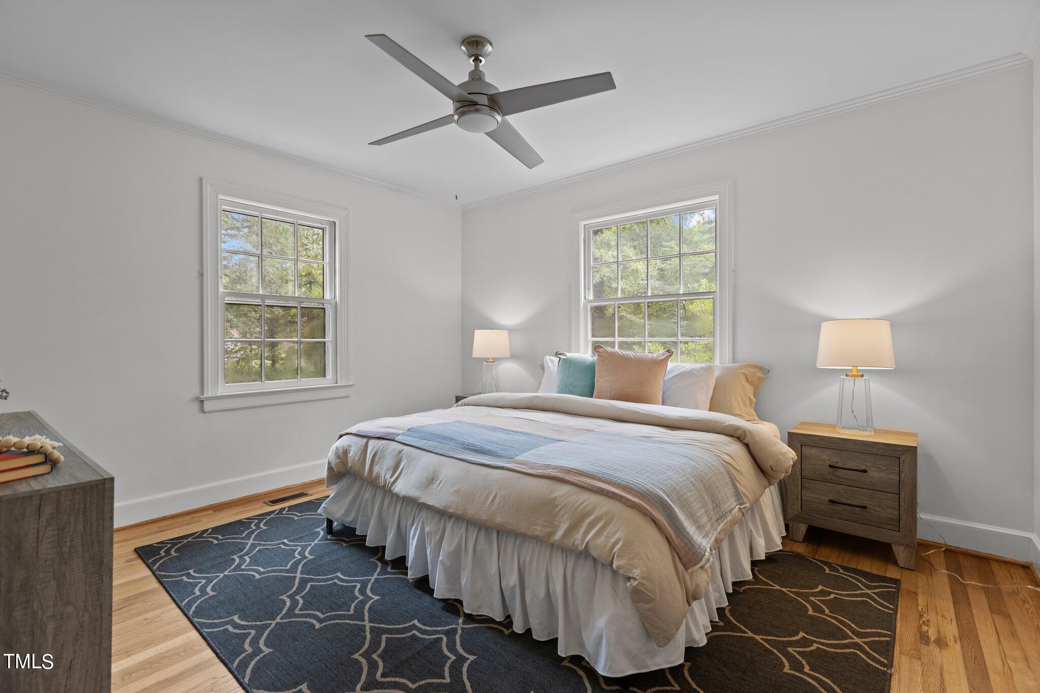 1702 James Street Durham, NC 27707 - Photo 15 of 40 a bedroom with bed and window