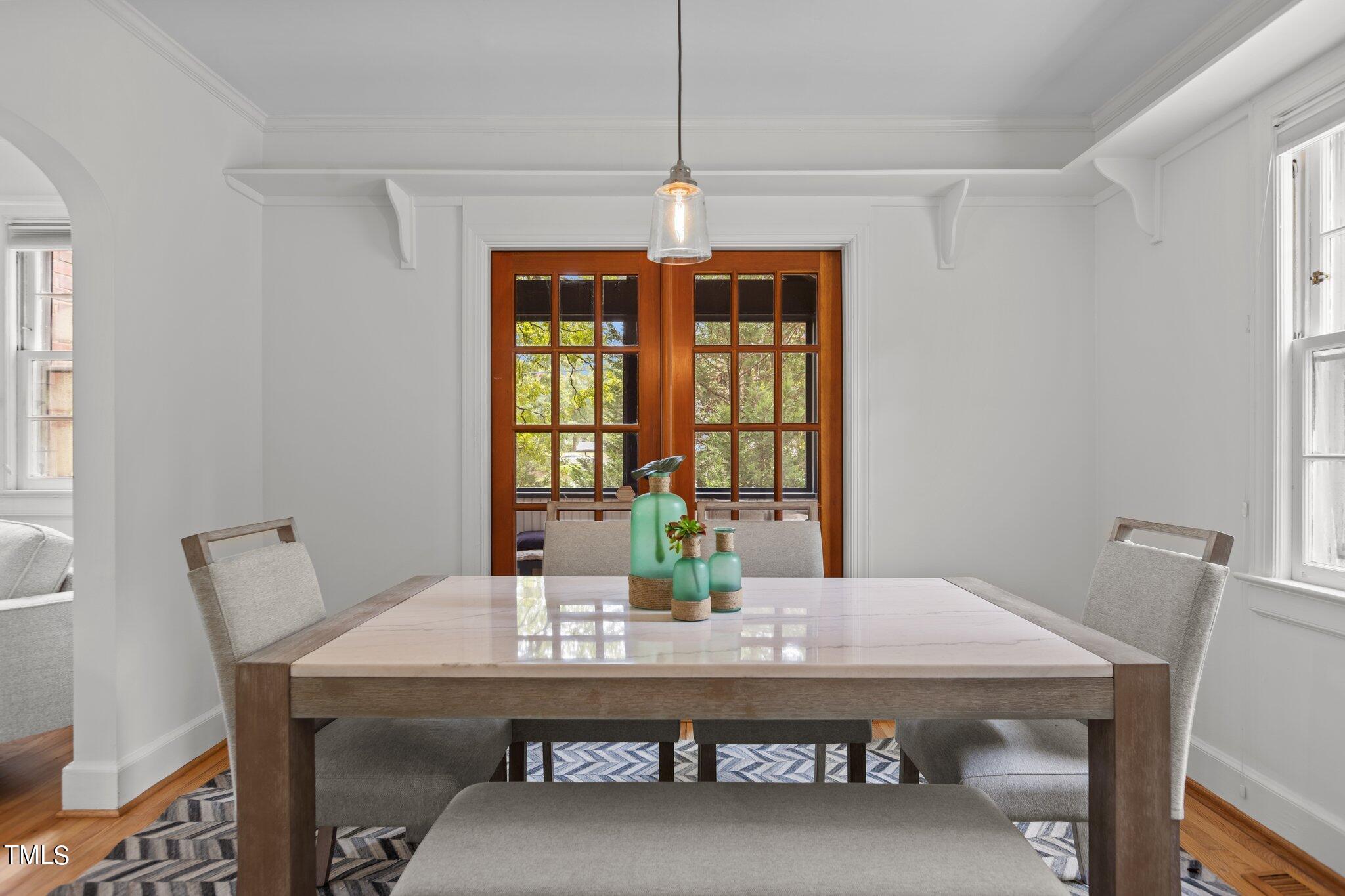 1702 James Street Durham, NC 27707 - Photo 20 of 40 a view of a dining room with furniture window and outside view