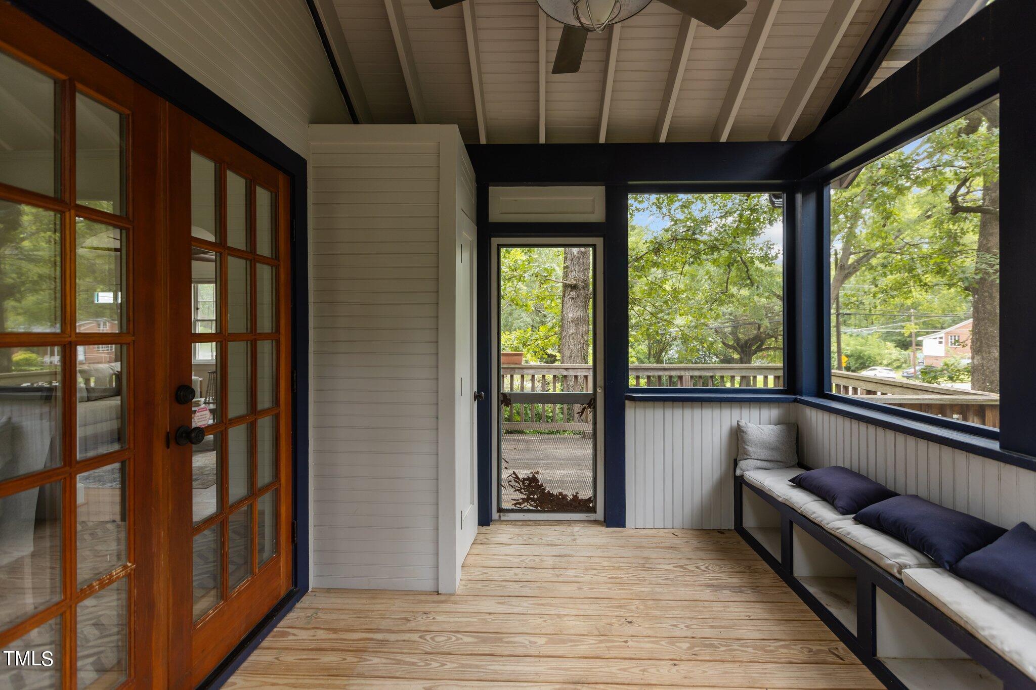 1702 James Street Durham, NC 27707 - Photo 22 of 40 a living room with furniture and large windows