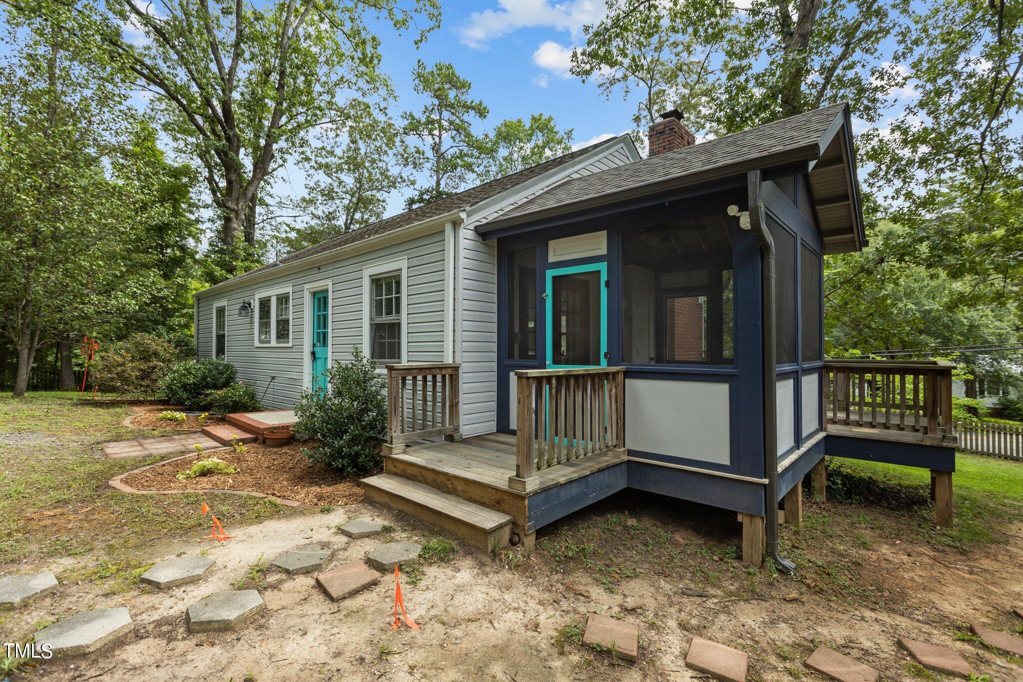 1702 James Street Durham, NC 27707 - Photo 26 of 40 a view of backyard with deck and a garden