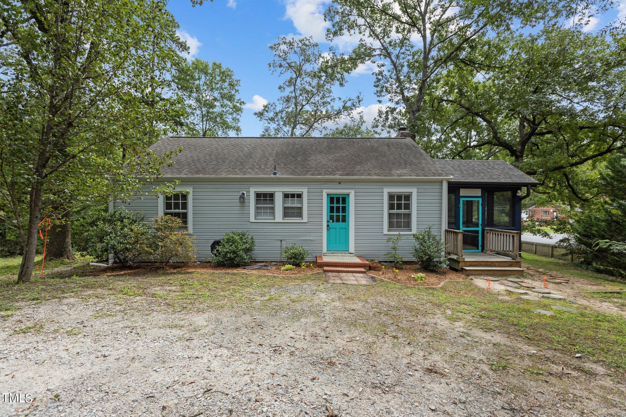 1702 James Street Durham, NC 27707 - Photo 27 of 40 a front view of a house with a yard and porch